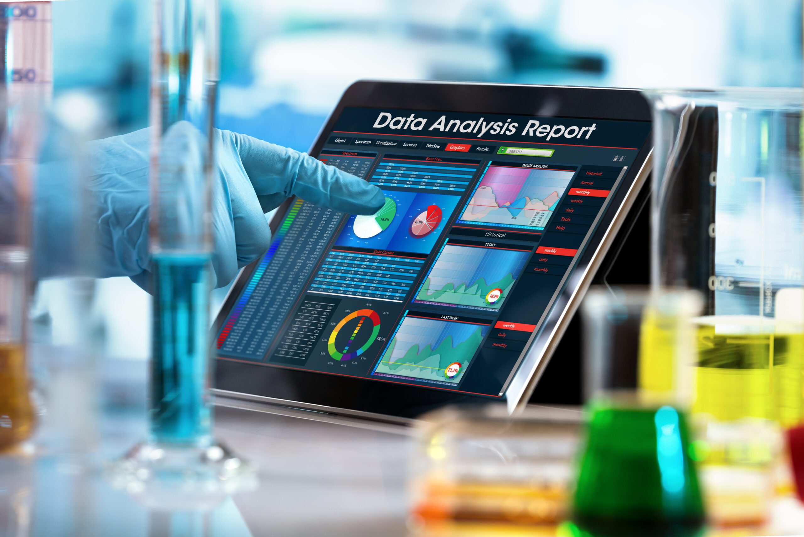 Image, researcher working with data analysis report in digital tablet representing RCH Solutions' Data Management Services for Life Sciences teams.